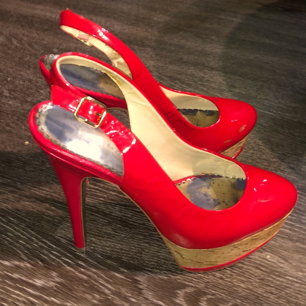 Bebe woman’s  bright red high heel shoes size 8